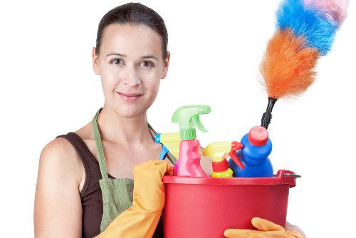 Regular cleaning service in a Hammersmith home with tidy living room and polished floors