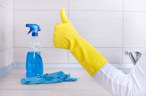 Local office cleaners working in a Hammersmith shared workspace