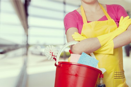 Cleaner finishing floors and fixtures after renovation work in Hammersmith